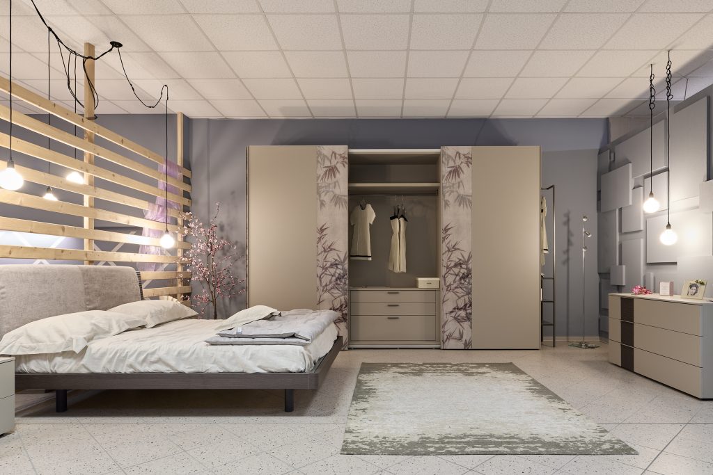 Camera da letto con colori tenui e lampadine a penzolo.